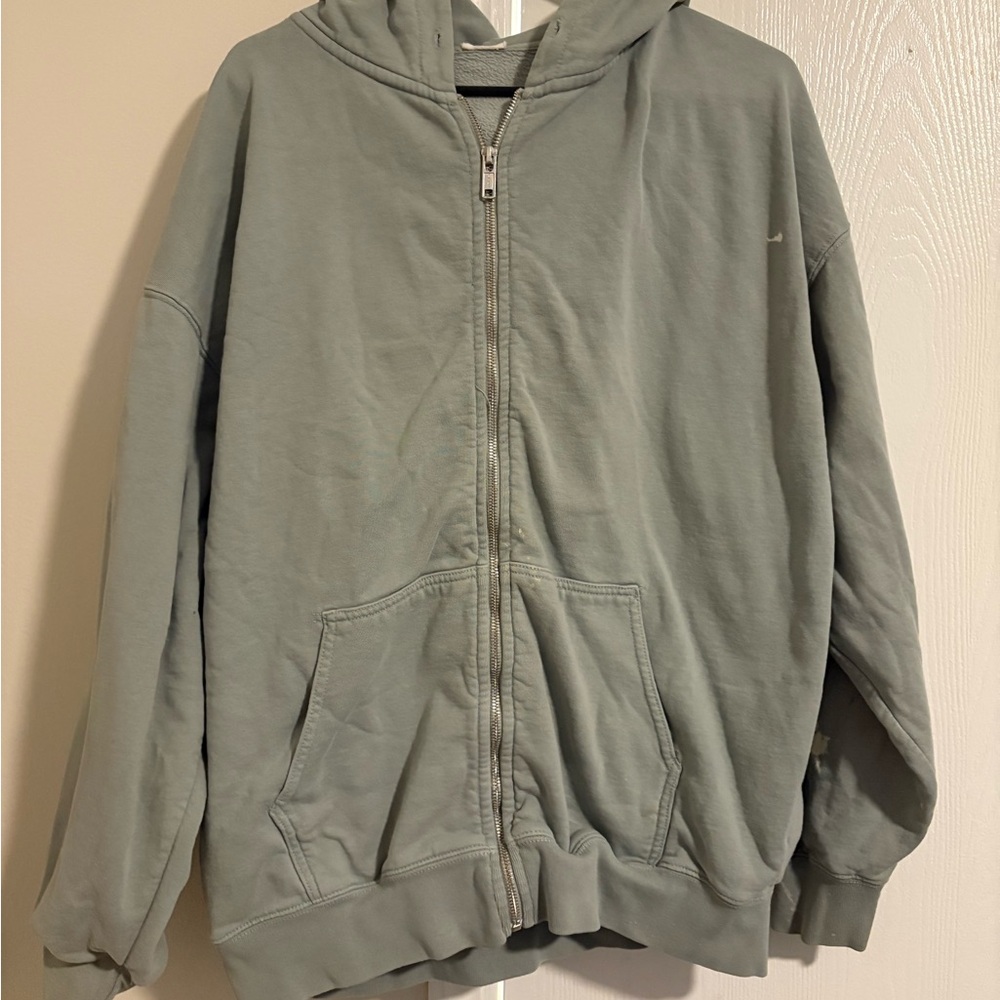 Brandy zip up hoodie has some bleach stains